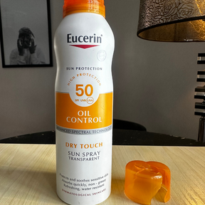 Oil control Dry Touch Transparent Sun Spray SPF50 (with broken cover)